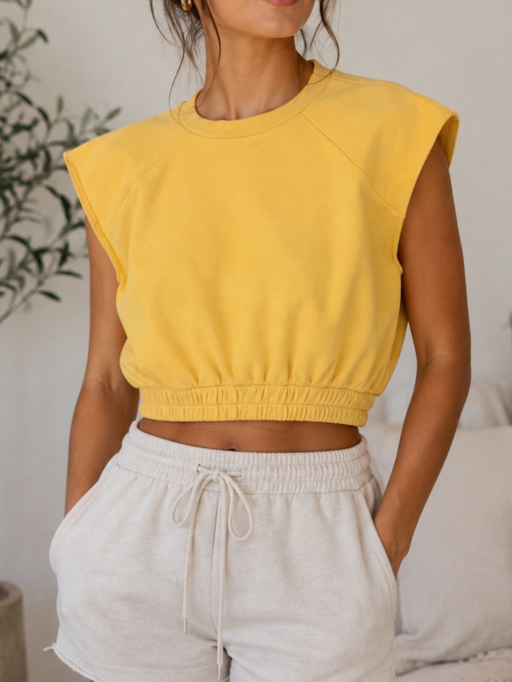 Lovers + Friends Sleeveless Cropped Pullover Top in Yellow